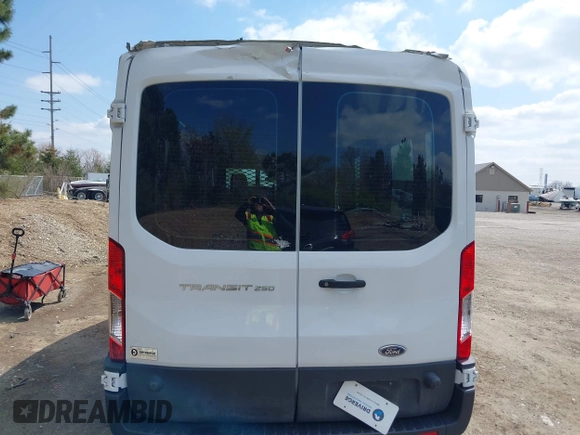 2021 Ford Transit Cargo with VIN 1FTBR1C85MKA66513, listed as a IAAI auction lot 42016528 with 18,174 mi miles and . Bid and sale history available at DreamBid. Image 16.