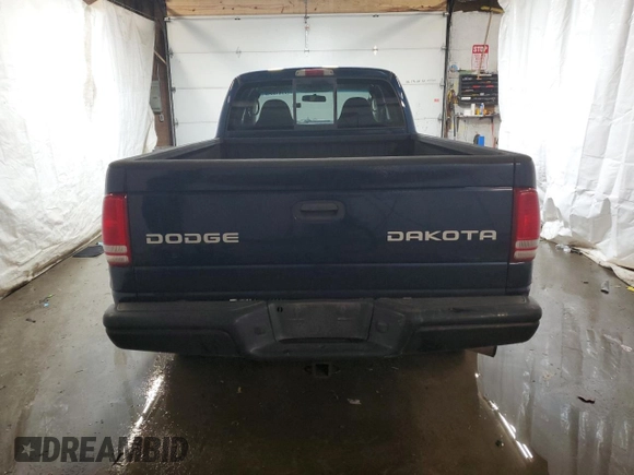 2004 Dodge Dakota Sport with VIN 1D7HG32N54S525290, listed as a Copart auction lot 77141804 with 217,012 mi miles and Salvage Title. Bid and sale history available at carsss.com. Image 6.