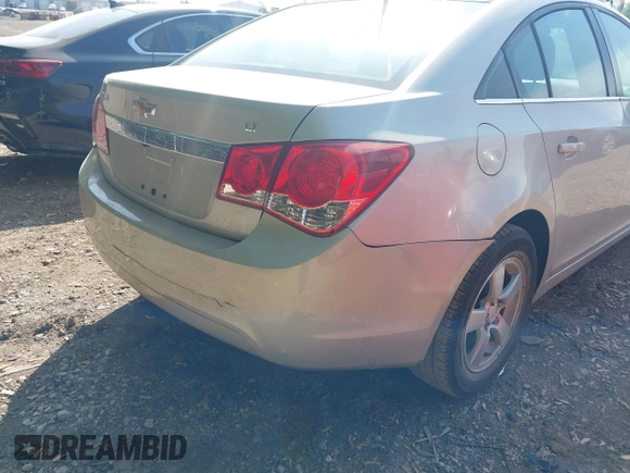 2014 Chevrolet Cruze 1LT with VIN 1G1PC5SB9E7180989, listed as a IAAI auction lot 42230408 with 112,927 mi miles and . Bid and sale history available at DreamBid. Image 6.