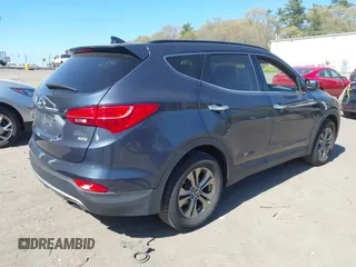 2014 Hyundai Santa Fe z VIN 5XYZUDLB1EG165458, wystawiony jako IAAI lot #42107789 z przebiegiem 94 395 mil mil oraz . Historia ofert i sprzedaży dostępna na DreamBid. Obrazek 4.
