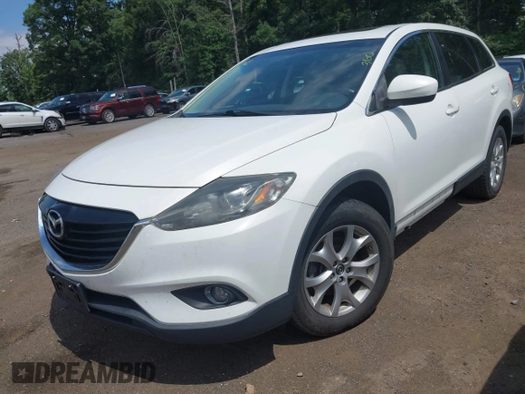 2014 Mazda CX-9 Touring z VIN JM3TB3CV7E0426900, wystawiony jako IAAI lot #42796725 z przebiegiem Nie podano mil oraz . Historia ofert i sprzedaży dostępna na DreamBid. Obrazek 17.