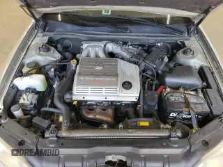 2001 Lexus ES 300 z VIN JT8BF28G910303864, wystawiony jako Copart lot #61811935 z przebiegiem 159 696 mil mil oraz Szkoda całkowita • Salvage title. Historia ofert i sprzedaży dostępna na DreamBid. Obrazek 11.