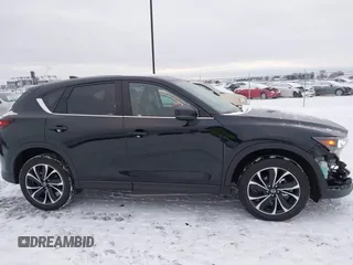 2023 Mazda CX-5 2.5 S Premium Plus Package with VIN JM3KFBEM6P0172890, listed as a IAAI auction lot 41312358 with 19,574 mi miles. Bid and sale history available at carsss.com. Image 14.