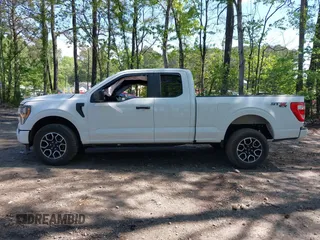 2023 Ford F-150 XL with VIN 1FTEX1EP8PFA78448, listed as a IAAI auction lot 42115100 with 31,433 mi miles and . Bid and sale history available at DreamBid. Image 15.