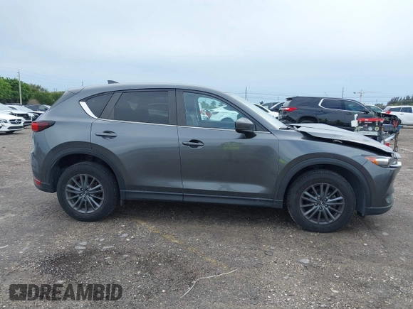 2021 Mazda CX-5 Touring with VIN JM3KFACM1M0461510, listed as a IAAI auction lot 41660439 with 30,352 mi miles. Bid and sale history available at carsss.com. Image 13.