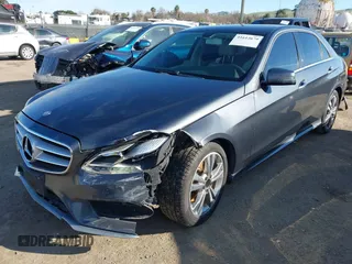 2014 Mercedes-Benz E-Class E 250 BlueTEC Luxury with VIN WDDHF0EB0EA876408, listed as a IAAI auction lot 41614679 with 283,695 mi miles. Bid and sale history available at carsss.com. Image 2.