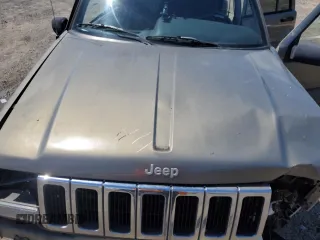 1997 Jeep Grand Cherokee Laredo with VIN 1J4GZ58S7VC505069, listed as a Copart auction lot 63255945 with 127,552 mi miles and Salvage title. Bid and sale history available at DreamBid. Image 12.