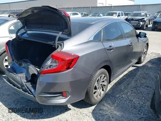 2016 Honda Civic EX with VIN 2HGFC2F74GH550780, listed as a IAAI auction lot 42135678 with 125,005 mi miles and . Bid and sale history available at DreamBid. Image 4.