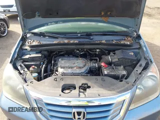 2008 Honda Odyssey Touring with VIN 5FNRL38868B047556, listed as a IAAI auction lot 41581617 with 220,436 mi miles. Bid and sale history available at carsss.com. Image 10.