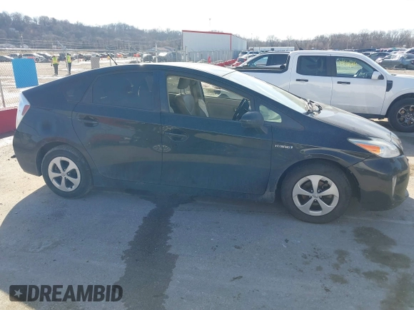 2015 Toyota Prius Four with VIN JTDKN3DU9F0403735, listed as a IAAI auction lot 41477562 with 113,934 mi miles. Bid and sale history available at carsss.com. Image 13.