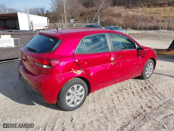 2023 Kia Rio 5-Door S with VIN 3KPA25AD5PE562295, listed as a IAAI auction lot 38591522 with 9,186 mi miles. Bid and sale history available at carsss.com. Image 4.