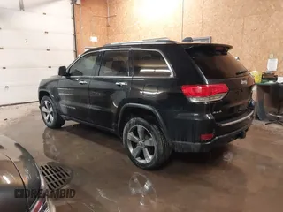 2015 Jeep Grand Cherokee Limited with VIN 1C4RJFBG8FC910133, listed as a IAAI auction lot 41289929 with 141,226 mi miles. Bid and sale history available at carsss.com. Image 3.