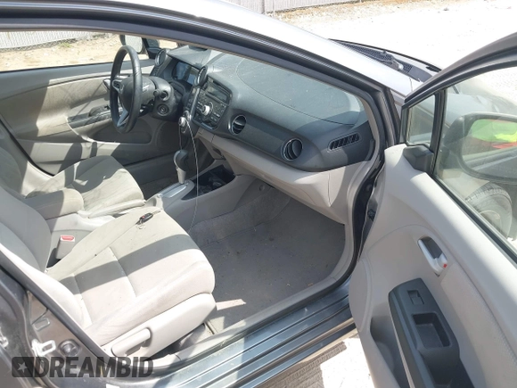 2012 Honda Insight LX with VIN JHMZE2H54CS004239, listed as a IAAI auction lot 42197049 with 113,350 mi miles and . Bid and sale history available at DreamBid. Image 5.