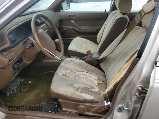 1991 Toyota Camry z VIN 4T1SV24E0MU379572, wystawiony jako Copart lot #78090294 z przebiegiem 242 052 mil mil oraz Szkoda całkowita • Salvage title. Historia ofert i sprzedaży dostępna na DreamBid. Obrazek 7.