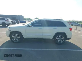 2011 Jeep Grand Cherokee Overland with VIN 1J4RR6GT2BC631909, listed as a IAAI auction lot 42564356 with 205,954 mi miles and . Bid and sale history available at DreamBid. Image 14.