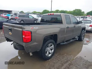 2014 Chevrolet Silverado 1500 LTZ with VIN 1GCVKSEC5EZ249444, listed as a IAAI auction lot 41904569 with 123,650 mi miles and . Bid and sale history available at DreamBid. Image 4.