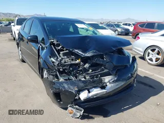2014 Toyota Prius Four with VIN JTDKN3DUXE1736731, listed as a IAAI auction lot 42106536 with 73,621 mi miles. Bid and sale history available at carsss.com. Image 6.
