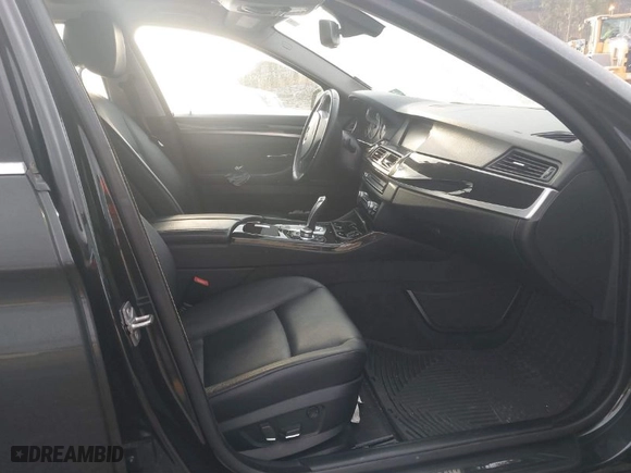 2012 BMW 5 Series 528i with VIN WBAXG5C52CDX05794, listed as a IAAI auction lot 41796084 with 104,022 mi miles. Bid and sale history available at carsss.com. Image 5.