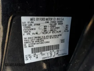 2004 Ford F-150 XLT with VIN 1FTPW14574KC13904, listed as a Copart auction lot 63027105 with 196,739 mi miles and Salvage title. Bid and sale history available at DreamBid. Image 12.
