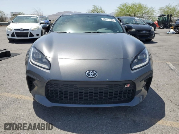 2023 Toyota 86 with VIN JF1ZNBB17P9750114, listed as a Copart auction lot 56693485 with 22,669 mi miles and Salvage title. Bid and sale history available at DreamBid. Image 5.