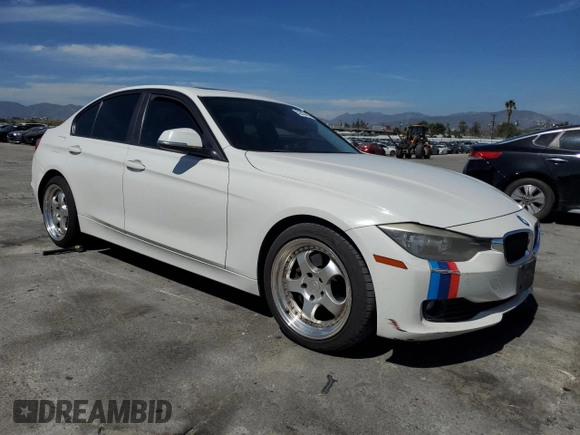 2014 BMW 3 Series 328i with VIN WBA3C1C56EK108374, listed as a Copart auction lot 52902485 with 136,407 mi miles and Salvage Title. Bid and sale history available at carsss.com. Image 4.