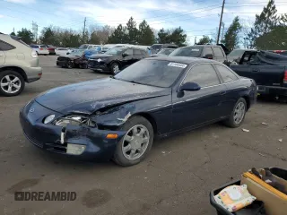 1995 Lexus SC with VIN JT8JZ31C5S0030892, listed as a Copart auction lot 81144444 with 163,874 mi miles and Salvage title. Bid and sale history available at DreamBid. Image 1.