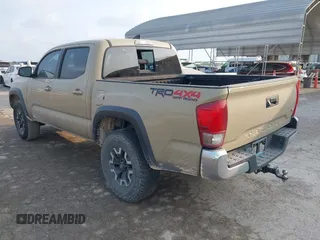 2017 Toyota Tacoma SR5 with VIN 5TFCZ5AN7HX097307, listed as a IAAI auction lot 42337528 with 98,000 mi miles and . Bid and sale history available at DreamBid. Image 3.