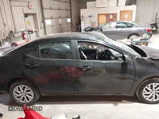 2019 Toyota Corolla L z VIN 5YFBURHE1KP940527, wystawiony jako IAAI lot #42120597 z przebiegiem 93 180 mil mil oraz . Historia ofert i sprzedaży dostępna na DreamBid. Obrazek 14.