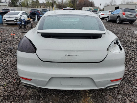 2015 Porsche Panamera 4 z VIN WP0AA2A72FL000789, wystawiony jako Copart lot #51923145 z przebiegiem 138 411 mil mil oraz Szkoda całkowita • Salvage title. Historia ofert i sprzedaży dostępna na DreamBid. Obrazek 6.