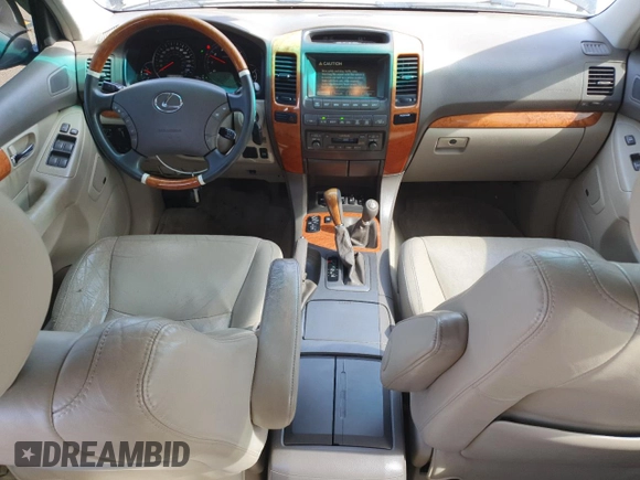 2007 Lexus GX 470 z VIN JTJBT20X570134681, wystawiony jako Copart lot #54259795 z przebiegiem 238 078 mil mil oraz Tytuł czysty. Historia ofert i sprzedaży dostępna na DreamBid. Obrazek 8.