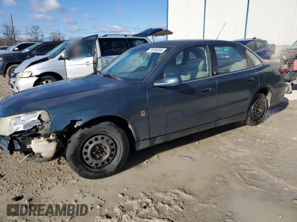 2003 Saturn LS z VIN 1G8JU54F93Y551015, wystawiony jako Copart lot #85593584 z przebiegiem 217 927 mil mil oraz Nie do naprawy. Historia ofert i sprzedaży dostępna na DreamBid. Obrazek 1.