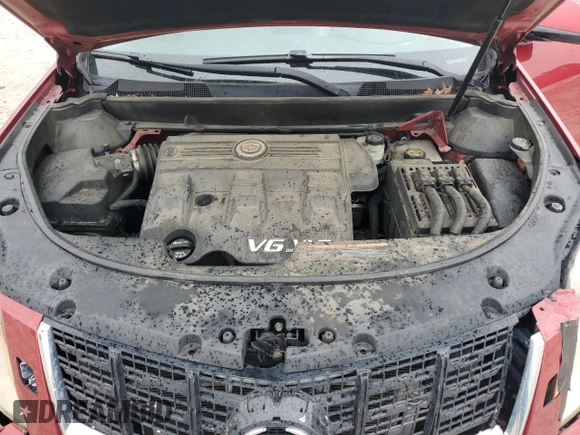2014 Cadillac SRX Performance Collection z VIN 3GYFNCE32ES560497, wystawiony jako Copart lot #53107835 z przebiegiem 140 378 mil mil oraz Szkoda całkowita • Salvage title. Historia ofert i sprzedaży dostępna na DreamBid. Obrazek 12.
