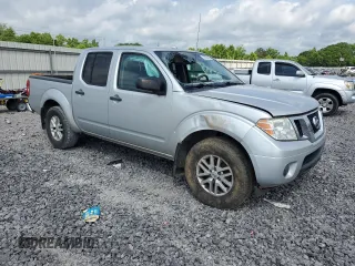 2018 Nissan Frontier SV with VIN 1N6AD0EVXJN751508, listed as a Copart auction lot 57654595 with 128,862 mi miles and Salvage title. Bid and sale history available at DreamBid. Image 4.