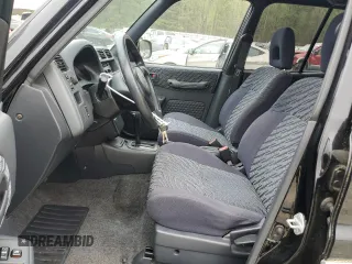 1998 Toyota RAV4 with VIN JT3GP10V7W0028970, listed as a Copart auction lot 51585215 with Not provided miles and Clean title. Bid and sale history available at DreamBid. Image 7.