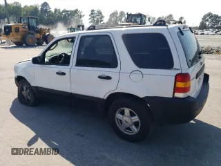 2004 Ford Escape XLS with VIN 1FMYU021X4DA07352, listed as a Copart auction lot 68909864 with 275,776 mi miles and Salvage Title. Bid and sale history available at carsss.com. Image 2.