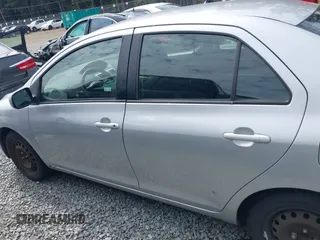 2009 Toyota Yaris with VIN JTDBT903391322248, listed as a IAAI auction lot 40112165 with 193,625 mi miles. Bid and sale history available at carsss.com. Image 14.