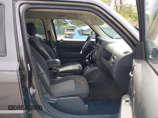 2014 Jeep Patriot Latitude with VIN 1C4NJRFB3ED847997, listed as a IAAI auction lot 42109140 with 121,299 mi miles and . Bid and sale history available at carsss.com. Image 5.