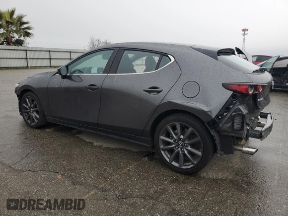 2020 Mazda Mazda3 Hatchback with VIN JM1BPALM6L1159659, listed as a Copart auction lot 45170845 with 57,391 mi miles and Salvage Title. Bid and sale history available at carsss.com. Image 2.