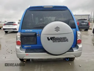 2005 Suzuki Grand Vitara LX with VIN JS3TD62V354200952, listed as a Copart auction lot 60374465 with 134,957 mi miles and Salvage title. Bid and sale history available at DreamBid. Image 6.