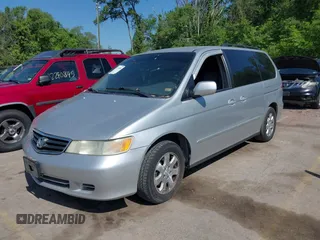 2004 Honda Odyssey EX-L with VIN 5FNRL18934B018040, listed as a IAAI auction lot 42241081 with 250,607 mi miles and . Bid and sale history available at DreamBid. Image 2.
