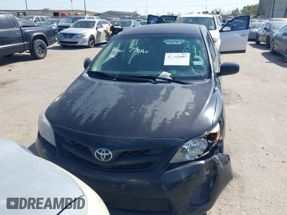 2012 Toyota Corolla L with VIN 5YFBU4EE5CP069365, listed as a IAAI auction lot 41852689 with 220,730 mi miles. Bid and sale history available at carsss.com. Image 12.