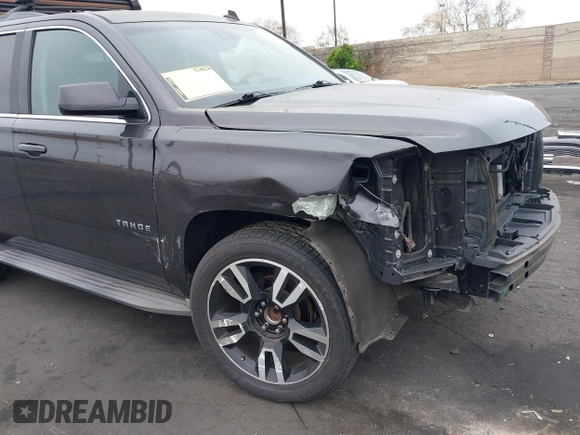 2015 Chevrolet Tahoe LT with VIN 1GNSCBKC1FR233898, listed as a IAAI auction lot 42004048 with 115,779 mi miles and . Bid and sale history available at DreamBid. Image 6.