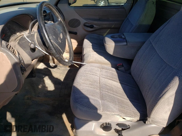 1998 Ford F-150 с VIN 1FTZF1729WKB49667, выставлен на аукционе Copart как лот 85818164 с пробегом 332 208 миль миль и Списание • Salvage title. История ставок и продаж доступна на DreamBid. Изображение 7.
