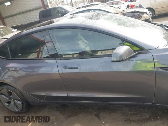 2023 Tesla Model 3 with VIN 5YJ3E1EA6PF567170, listed as a IAAI auction lot 41837040 with 36,193 mi miles and . Bid and sale history available at DreamBid. Image 13.