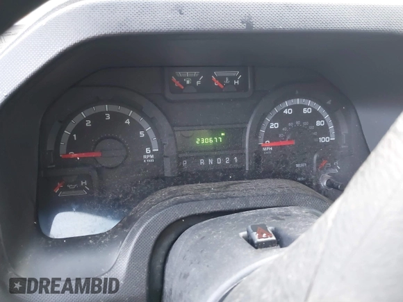 2013 Ford Econoline Cargo Commercial with VIN 1FTNE1EW2DDB11061, listed as a IAAI auction lot 41808318 with 230,677 mi miles. Bid and sale history available at carsss.com. Image 7.