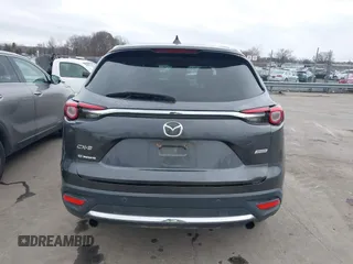 2016 Mazda CX-9 Grand Touring with VIN JM3TCADY4G0111310, listed as a IAAI auction lot 41532851 with 178,907 mi miles and . Bid and sale history available at DreamBid. Image 16.