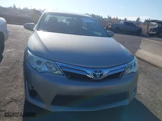 2014 Toyota Camry Hybrid LE with VIN 4T1BD1FK8EU097505, listed as a IAAI auction lot 38159878 with 379,573 mi miles. Bid and sale history available at carsss.com. Image 6.