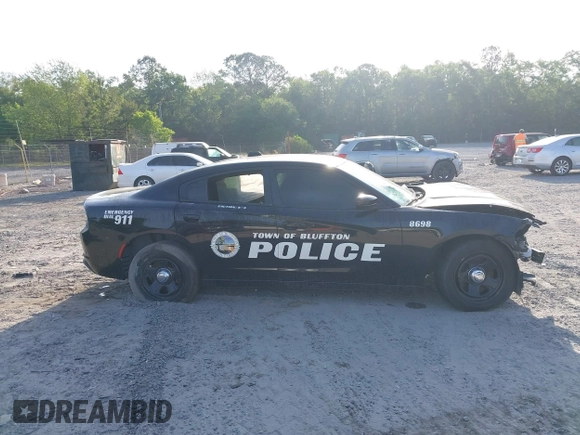 2019 Dodge Charger Police with VIN 2C3CDXAT0KH688698, listed as a IAAI auction lot 42090480 with 49,151 mi miles and . Bid and sale history available at DreamBid. Image 14.