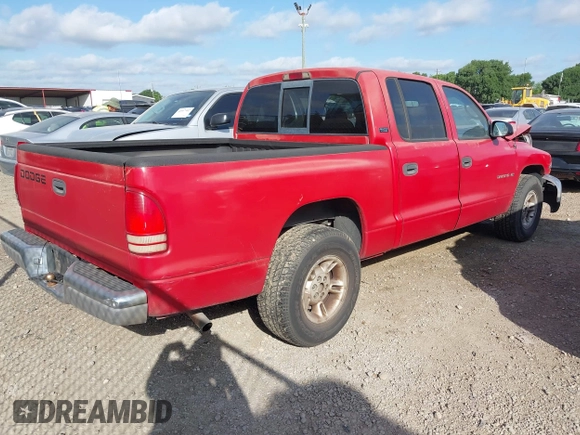 2000 Dodge Dakota Sport with VIN 1B7GL2AN0YS705134, listed as a IAAI auction lot 41997957 with 219,659 mi miles. Bid and sale history available at carsss.com. Image 4.