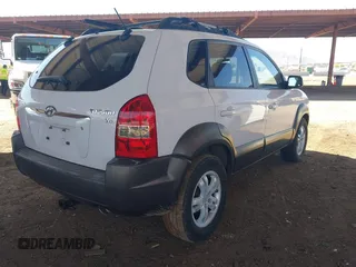 2006 Hyundai Tucson GLS with VIN KM8JN12D16U332117, listed as a IAAI auction lot 41831236 with 160,557 mi miles. Bid and sale history available at carsss.com. Image 4.